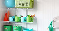 Garage organization for outdoor toys. Portable bins can be taken down to play and returned when finished. Step stool for kids to reach higher bins.